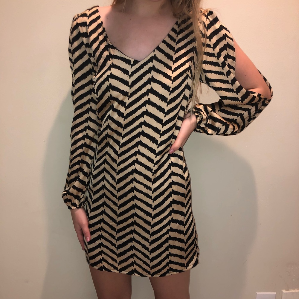 Black and gold patterned dress